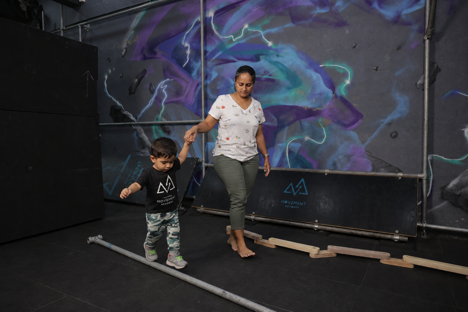 Parent and child learning movement together